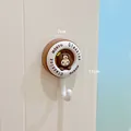 Cute brown cartoon bear adhesive wall hook with 7x11cm dimensions for home organization - Coffee Bear