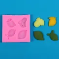 Roze siliconen citroenvorm voor fondant met afgewerkte fruitstukjes voor decoratie - Roze