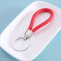 Stylish red braided leather keychain strap with silver metal ring for DIY - Red