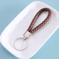 Minimalist braided brown leather strap keychain with premium silver metal ring finish - Brown