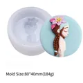 Detailed view of the girl design silicone mold with a finished floral soap example - Closed-Eye Girl (50-1470-D) / White