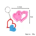 Vista dettagliata dello stampo in silicone a cuore con dimensioni ed esempio di portachiavi. - Stile Contorno a Cuore (50-2963-A)