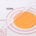Close-up view of clear acrylic textured rolling pin creating patterns on dough - Fine Stripes Style (52006)