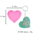 Stampo in silicone cuore Cupido 6,7x5,7 cm con esempio di portachiavi finito - Stile Motivo Cupido (50-2962-A)