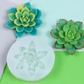 Detailed view of 3D succulent silicone mold with finished green and teal resin crafts - White