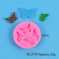 Macro view of a 5.6cm butterfly silicone mold for fondant cake decoration and candy. - Triple Butterfly (50-2779-A) / Pink