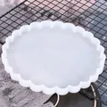 Detailed macro view showing the scalloped edge of a round white silicone mold for DIY resin - Round Scalloped Edge / White