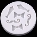 White silicone mold featuring bowtie, necktie, and mustache shapes for cake decorating. - Round Tie Bow Tie Mustache Mold (50-1468) / Gray