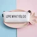 Minimalist white PU leather pencil case with Love What You Do slogan and sturdy zipper - Letter Style / White