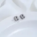 Silberfarbene Edelstahl-Zwischenperle Buchstabe R für die DIY-Schmuckherstellung - Buchstabe R (H79-R) / 1 Stück / Stahlfarbe
