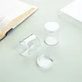 Close-up view of clear acrylic round storage jars for beads and jewelry craft accessories - 1 Piece / 3.9x4.9mm Single Small Round Box