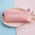 Minimalist pink PU leather pencil case featuring LOVE WHAT YOU DO printed slogan - Letter Style / Pink