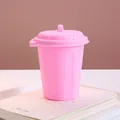 Pink mini desktop trash can with lid used as a creative office pen holder storage - Creative Trash Can Style / Pink