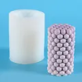 Detailed view of white silicone mold and purple bubble texture candle on blue background - Stacked Sphere Style (50-2744-D) / White