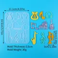 Stampo in silicone a forma di strumenti musicali e note per gioielli in resina fai da te - Ciondolo Strumento Musicale (60-1442)