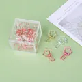 Bunte sternförmige hohle Metall-Binder-Clips in einer klaren Acryl-Aufbewahrungsbox - Bunte Blume / 12er Set