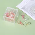 Bunte herzförmige hohle Vielzweckklemmen Set in transparenter Acryl-Aufbewahrungsbox - Irisierender Tropfen / 12er Set