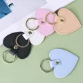 Porte-clés colorés en cuir en forme de cœur avec texture saffiano et anneaux dorés - Cœur / 5 Pièces / Multicolore
