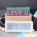 Detailed view of the rectangular LOVE U letter silicone mold and finished candle art - Rectangular LOVE U Style