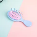 Mini Massage-Haarbürste mit Luftkissen in Pastellblau und Rosa für Mädchen und Kinder - 15-20cm / Blau