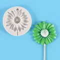 Detailed view of daisy flower silicone mold with a finished green fondant lollipop. - Small Daisy 50-2443 / Gray