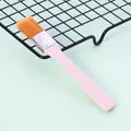 Nylon pastry brush with orange bristles and wooden handle for baking - Size 3
