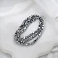 Makroansicht unregelmäßig facettierter, galvanisierter Glasperlen in Gunmetal - Irisierender Facettierter Stil (9#) / 90 Stück/Packung
