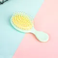 Mini pastellgrüne Luftkissen-Haarbürste mit Massageborsten für Mädchen und Kinder - 15-20cm / Frisches Grün