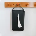Modern black hanging leather tissue box holder mounted on a minimalist wooden wall hook - Black