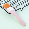 Wooden handle nylon pastry brush with orange bristles for baking and BBQ use - Size 5