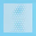 Detail showing hollow geometric triangle pattern on semi-transparent cake stencil template - Triangle Gradient Geometric Style (81039) / 13x13cm