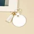 Porte-clés minimaliste en cuir blanc rond avec élégant gland et matériel doré. - Glands ronds / Blanc Rond Gland