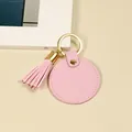 Porte-clés rond en cuir rose de qualité avec pompon assorti et anneau en métal doré - Glands ronds / Rose Rond Gland