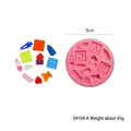 Moule en silicone rose pour fondant et chocolat, 9cm de diamètre, avec motifs de bébé - Moule Rond Lettres Bébé (04104-A) / Diamètre 9cm