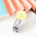 Premium transparent nail clipper featuring a cute yellow cartoon dog character patch - Cartoon Dog Style