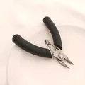 Detailed view of stainless steel jewelry diagonal pliers with ergonomic black handles - 4 Inch Diagonal Jewelry Steel Pliers (Black)