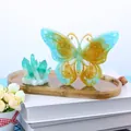 Detailed display of DIY butterfly resin ornament and crystal clusters on golden tray. - Single Butterfly Style (60-1101) / Single Hole