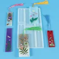 Detail view of irregular silicone molds with finished colorful resin bookmarks. - Irregular Bookmark Mold