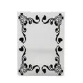 Macro detail of embossing folder featuring black heart and scrollwork pattern designs - Heart Scroll (58030)