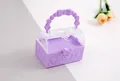 Close-up of the purple bow handle and clear heart lid on a cute stationery gift box - Single Box / Purple