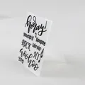 Detailed macro view of a translucent plastic embossing folder with positive hand-lettered text. - Artistic Text (58037)