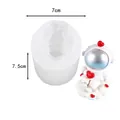 Astronaut silicone mold for cake decorating showing dimensions 7cm and 7.5cm - 50-2619-D