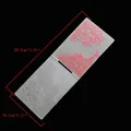 Close-up of plastic embossing folder with peony floral patterns and dimensions - Peony Floral Style (55068)