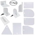 11-piece set of white plastic cake scrapers with various decorative serrated edges. - Combination Set (78083)