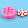 Detailed view of a pink snowflake silicone mold showing 7cm size and 63g weight details - Round Snowflake Hollow Style (50-3368-A) / 7cm