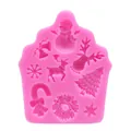 Close-up macro view of a pink Christmas silicone mold featuring various festive patterns - Christmas Multi-Element Set (50-1190-A) / Pink