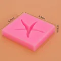 Pink starfish shaped silicone fondant mold for cake decorating, dimensions 4.9cm x 0.9cm. - Square Starfish Style (50-1499)