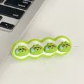 Cute green frog cartoon desktop cable organizer for data cables, 6cm x 2cm size. - Speechless Frog
