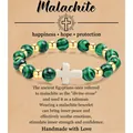Handgemaakte 8mm malachiet kralenarmband met wit kruis en gouden kralen op kaart - Malachite gold beads