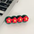 Cute cartoon red flower desktop cable organizer with dollar signs, compact 6x2cm size - Money Flower